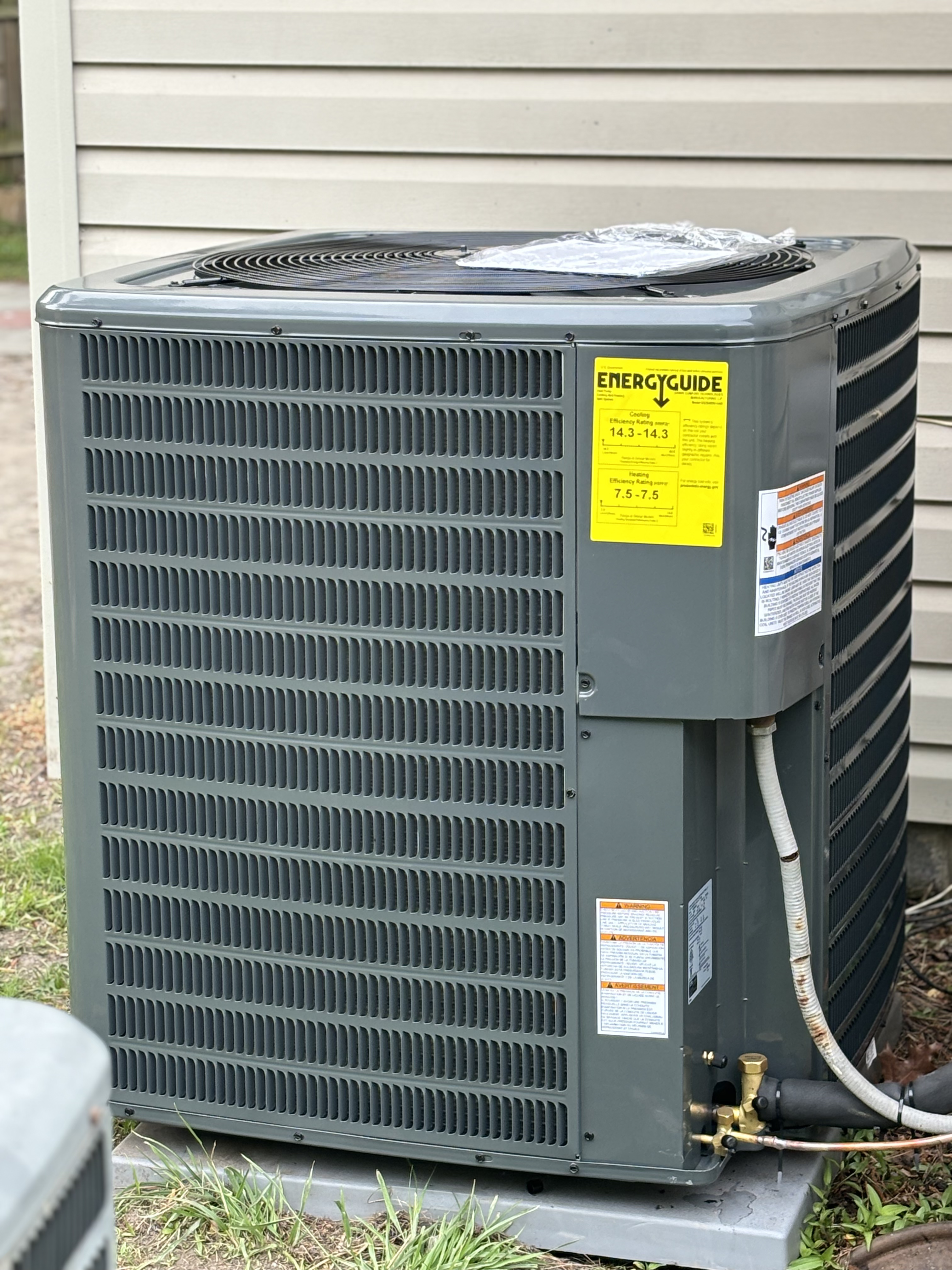 Central AC condenser installation