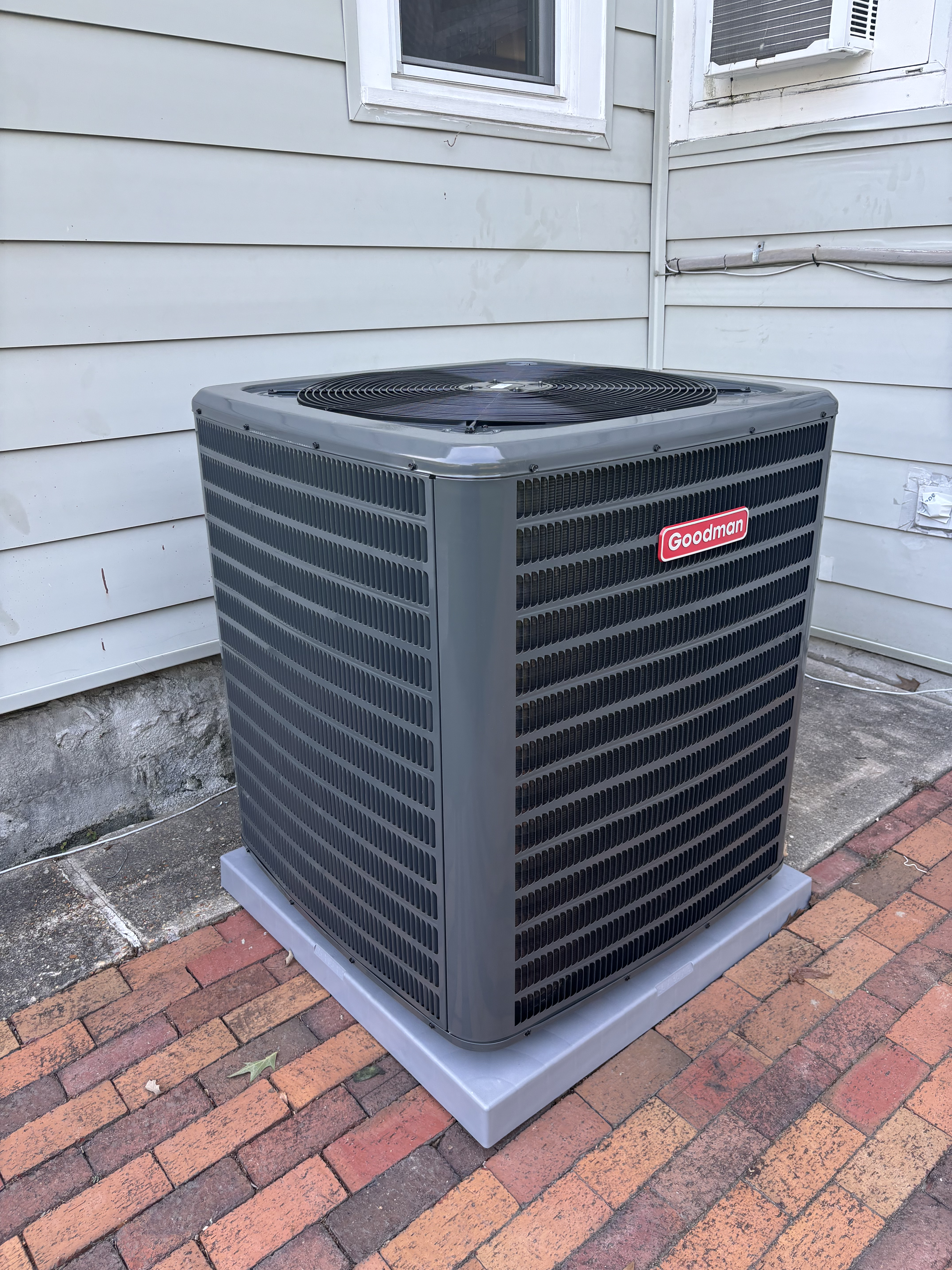 Goodman AC system replacement on concrete pad